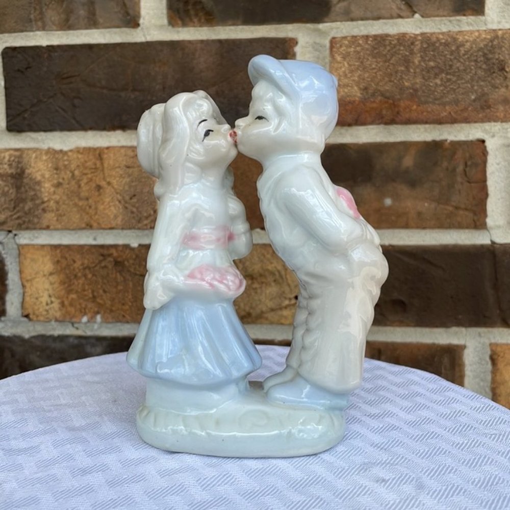 Porcelain Figurine Statue of a Girl and Boy Kissing